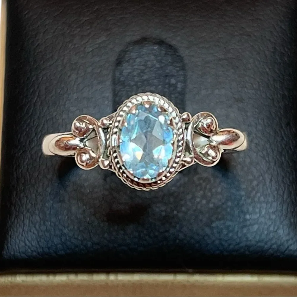 Elegant Sterling Silver and Blue Topaz Gemstone Ring Size 10